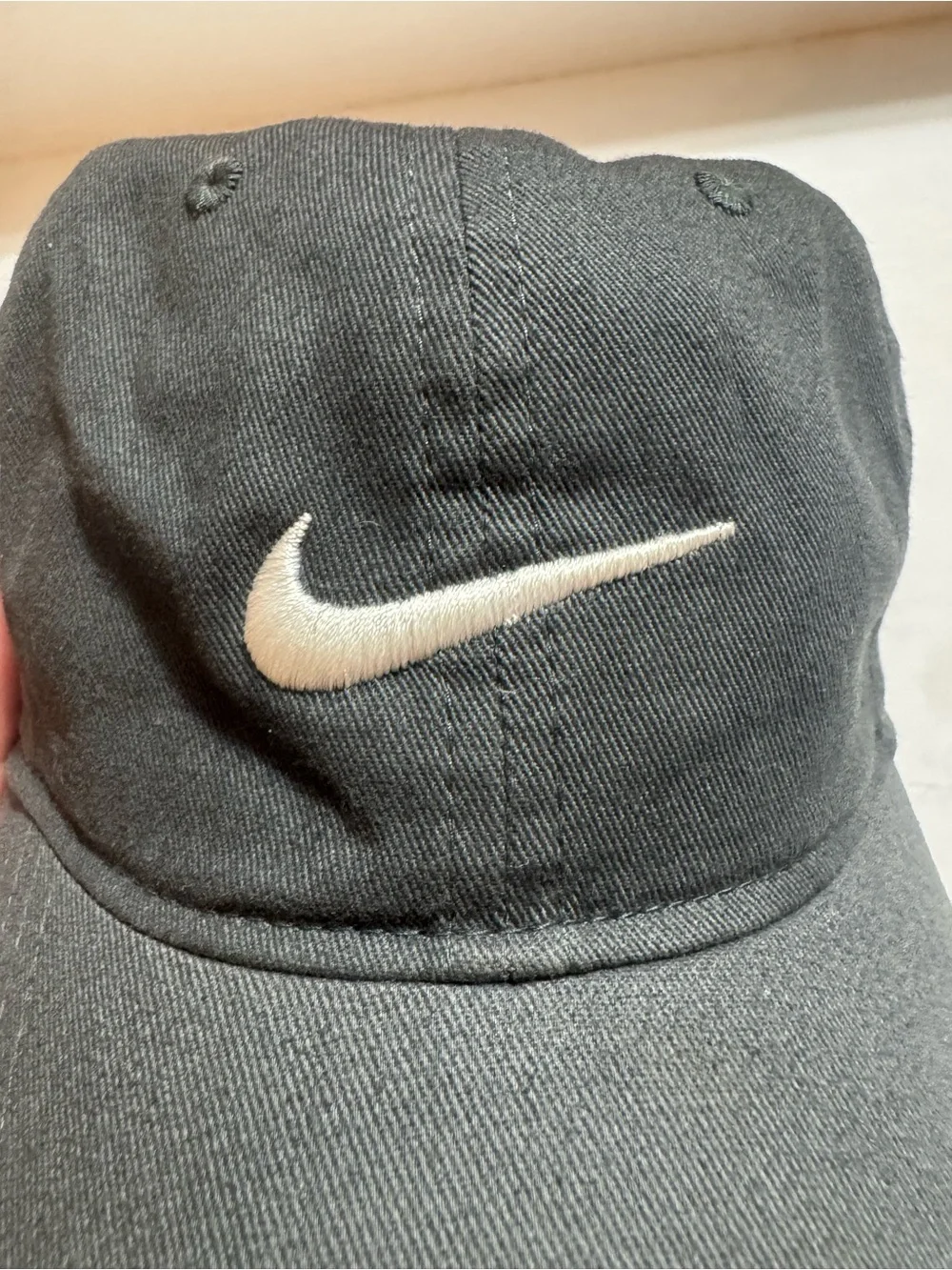 Nike Black Cap with White Swoosh Logo